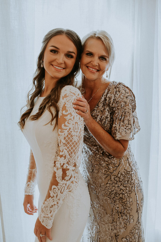 beautiful bride and her mother before the ceremony