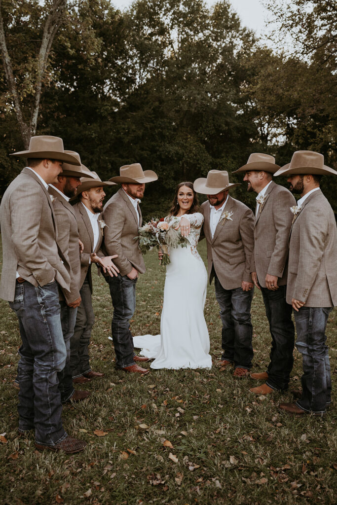 Bride and Groom with the groomsmen 