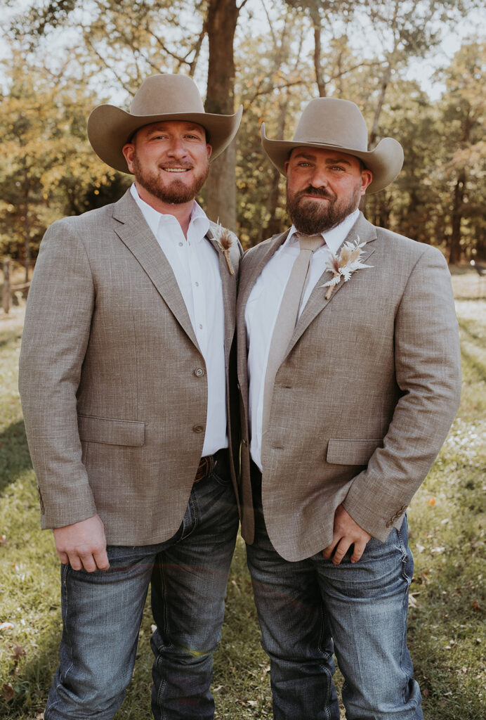 groom with his friend after their ceremony 