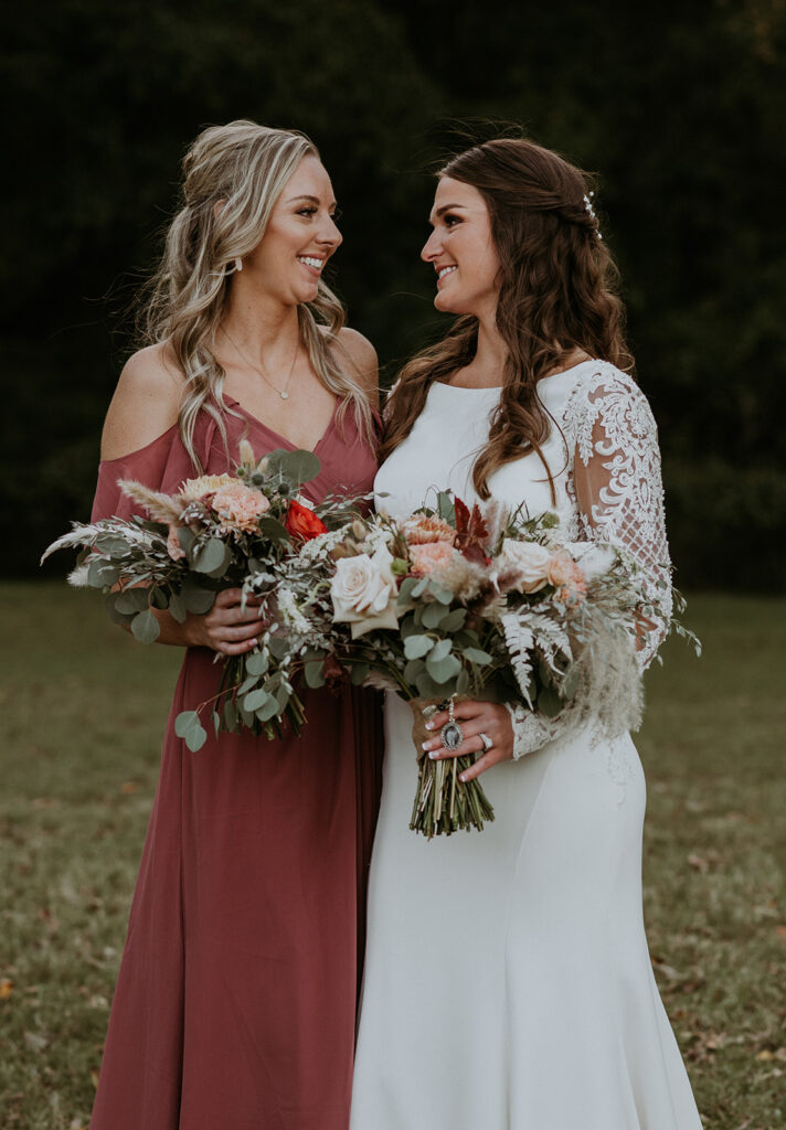 gorgeous bride with one of her bridesmaids