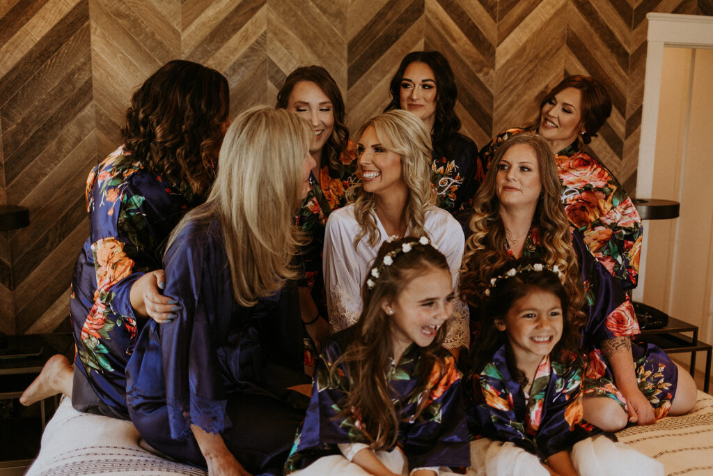 bride with her bridesmaids before getting ready