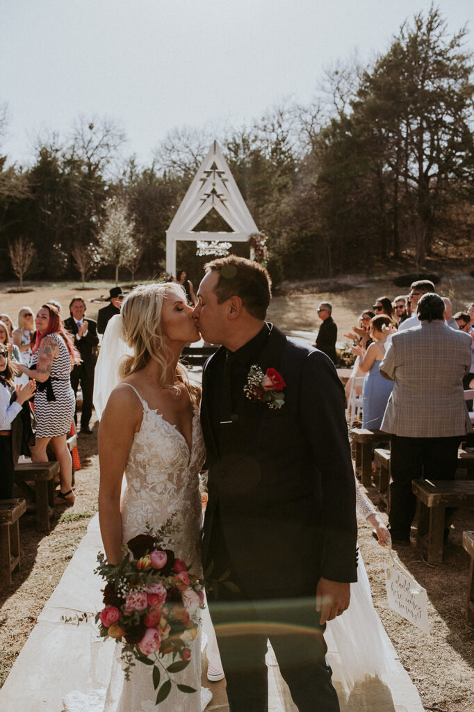 gorgeous bride and groom after their ceremony at their beautiful wedding  | Kelli and Adam's Wedding Day At Bethel Rock, Texas