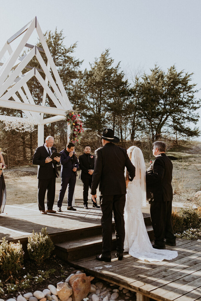 bride walking down the aisle | Kelli and Adam's Wedding Day At Bethel Rock, Texas