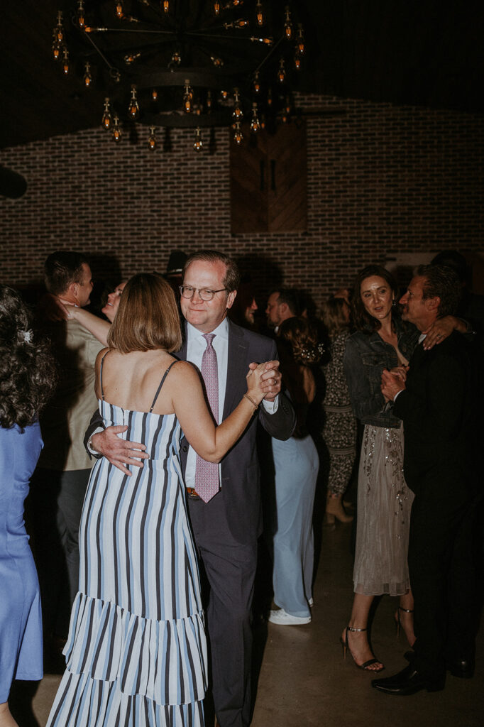 guests dancing at the reception