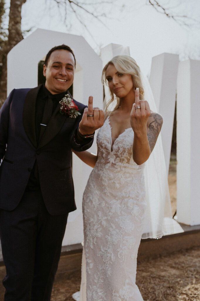 beautiful bride and groom showing their rings after their ceremony at their beautiful wedding | Kelli and Adam's Wedding Day At Bethel Rock, Texas