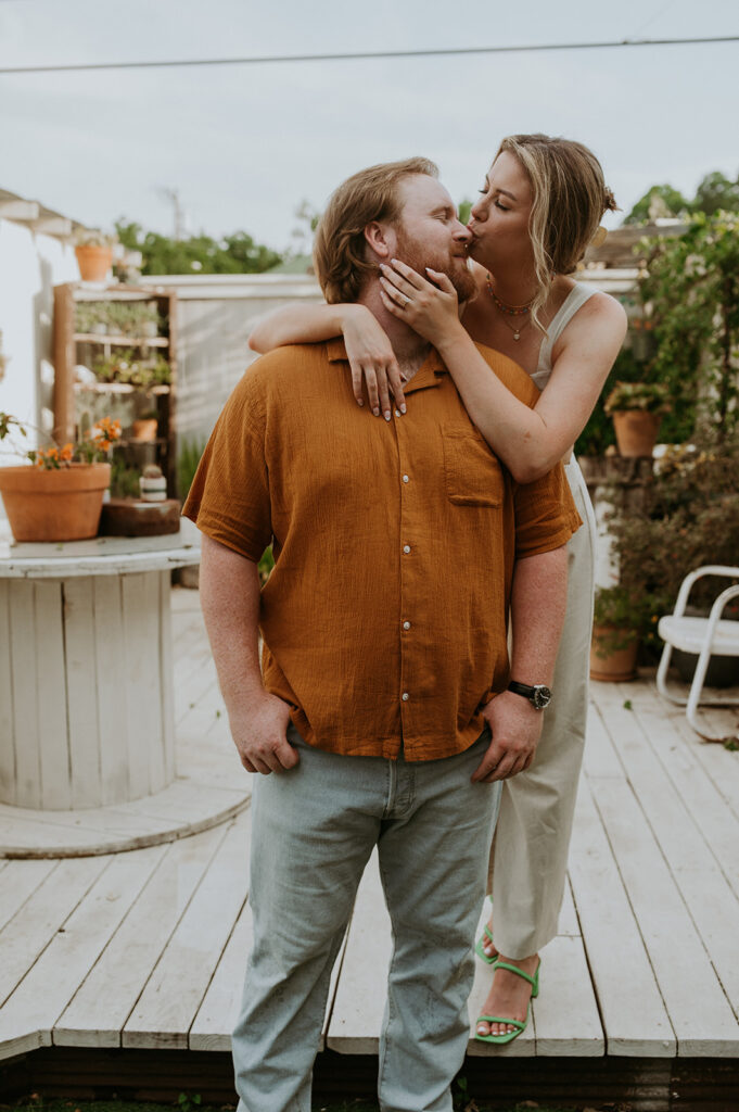 couple kissing at their unique engagement session