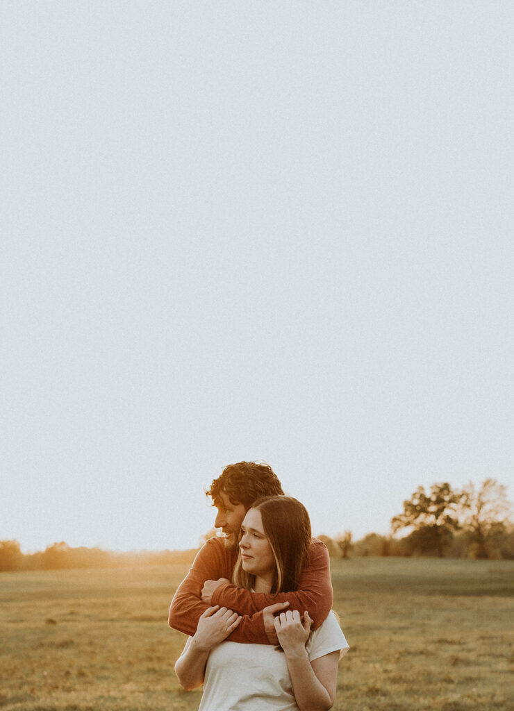 couple hugging during sunset 