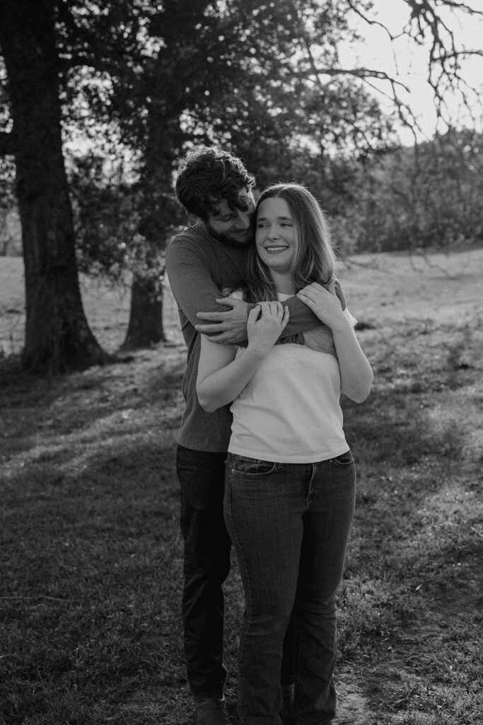 b&w photo of the newly engaged couple