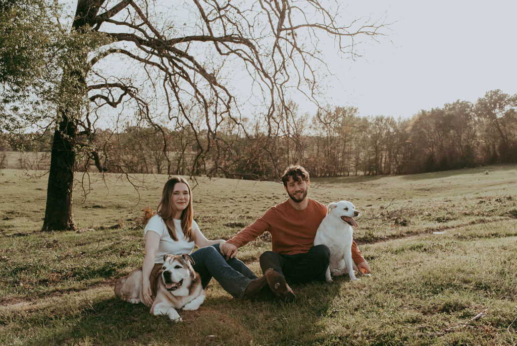 beautiful couple with their dogs during their engagement session 