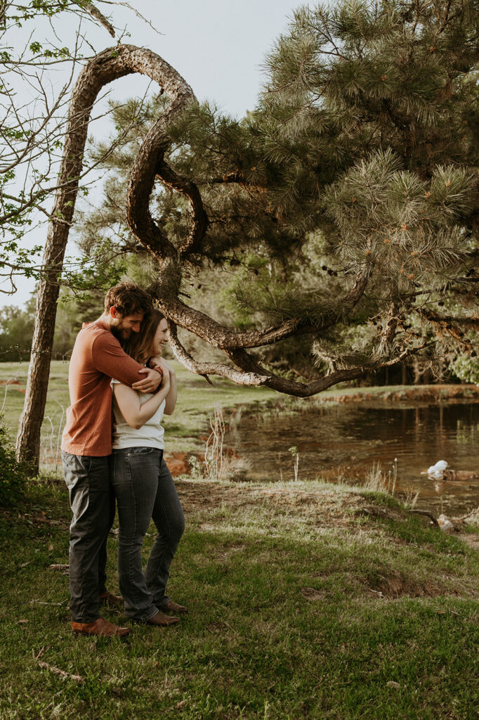 beautiful couple looking at nature during their engagement session