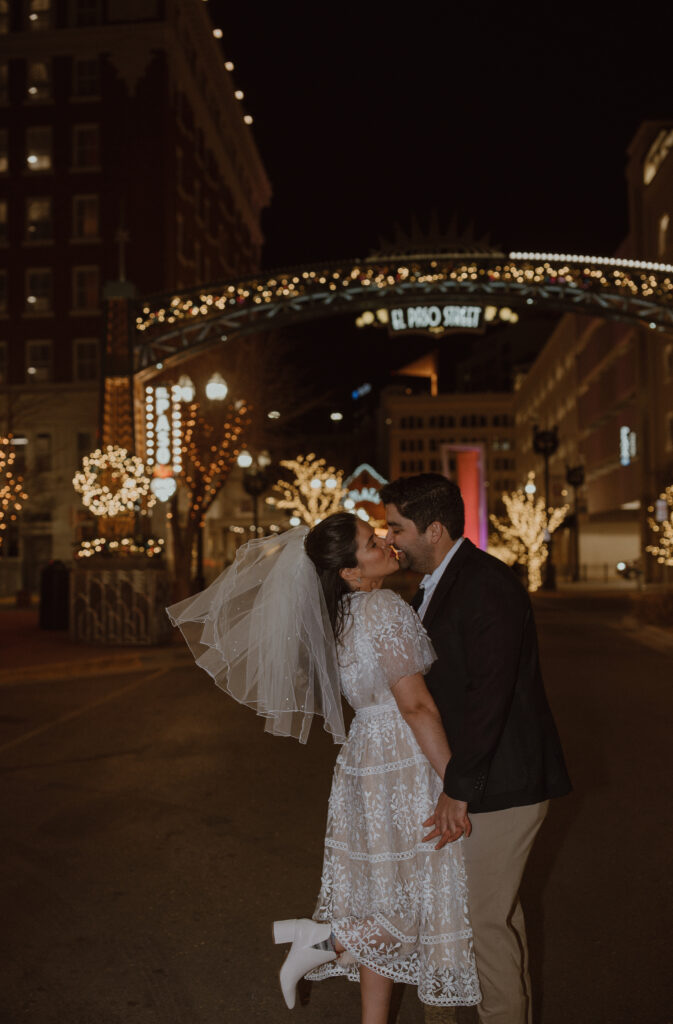 couple kissing each other at downtown el paso