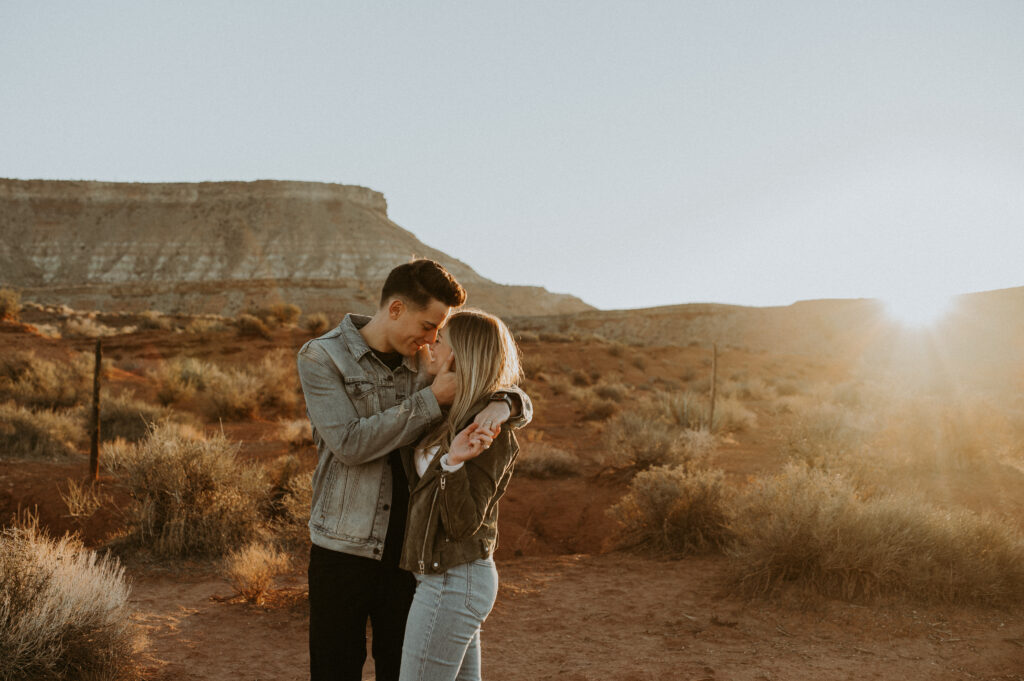 couple kissing during their adventure engagement session
