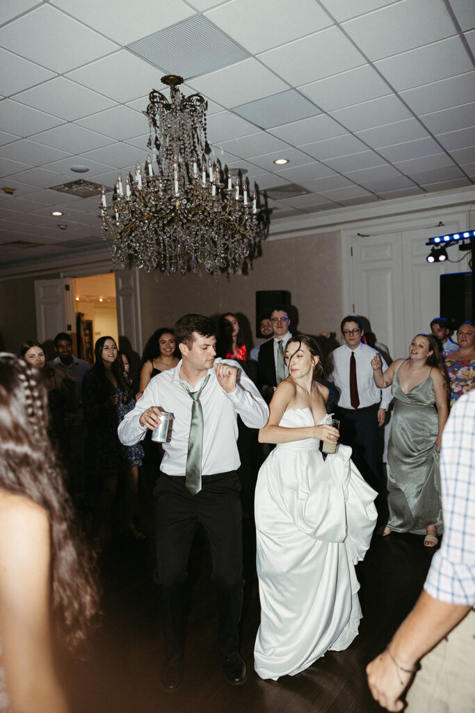 bride and groom dancing at their wedding reception