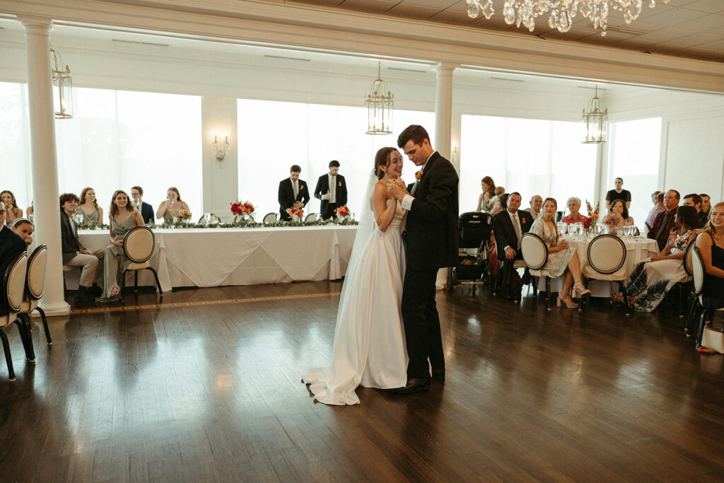 bride and groom dancing at their luxurious wedding day 