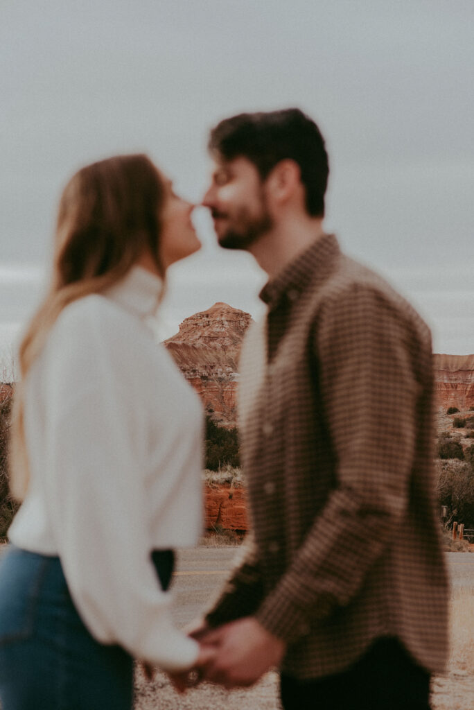 couple looking at each other during their engagement session 