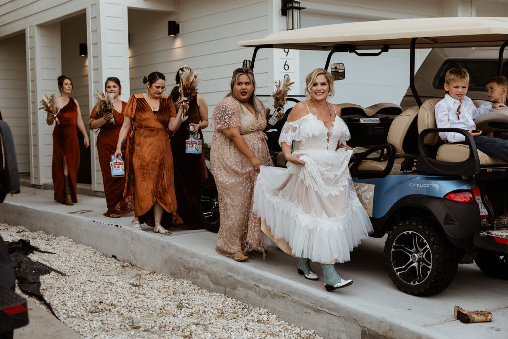 bride and bridesmaids heading to the wedding ceremony