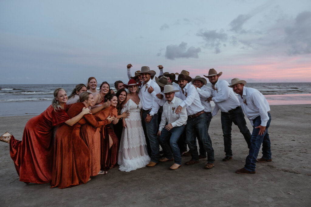 bride and groom with their friends at their intimate texas coast wedding