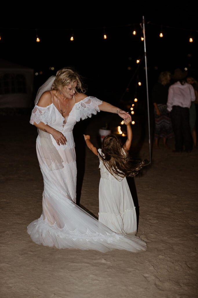 bride dancing at her texas coast wedding