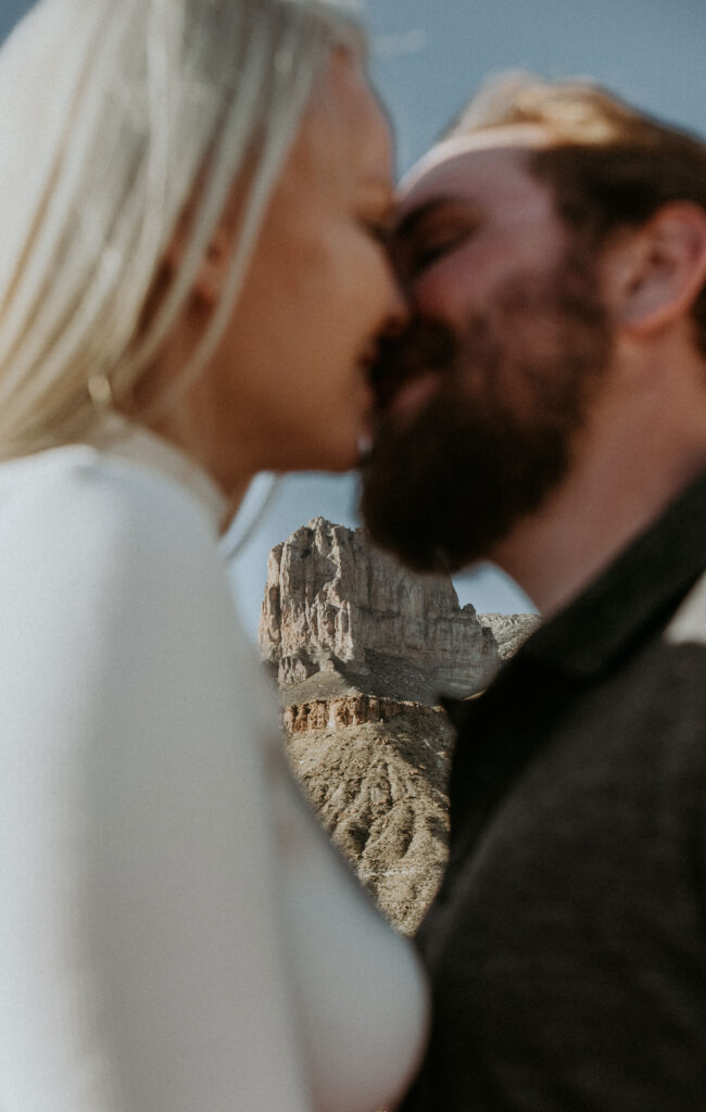 couple kissing during their photoshoot
