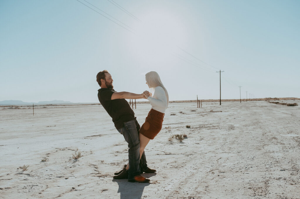 couple playing during their engagement session 