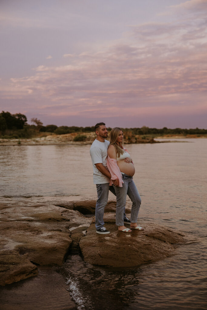 couple hugging during their sunset photoshoot 